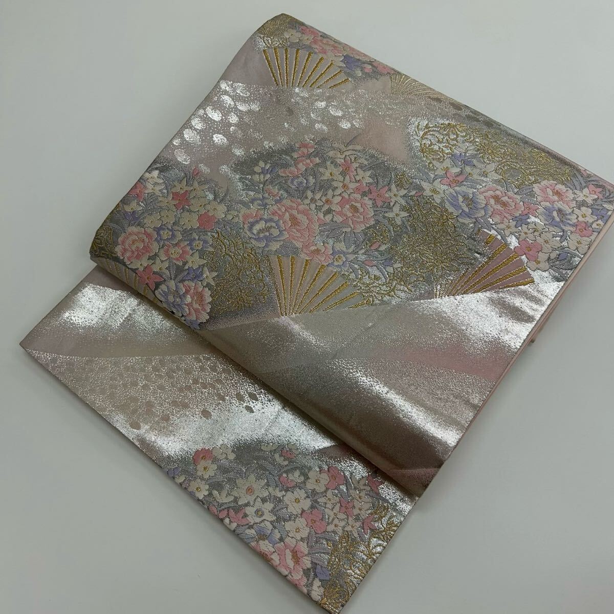 ST-03 close-up showing gold filigree field and florals